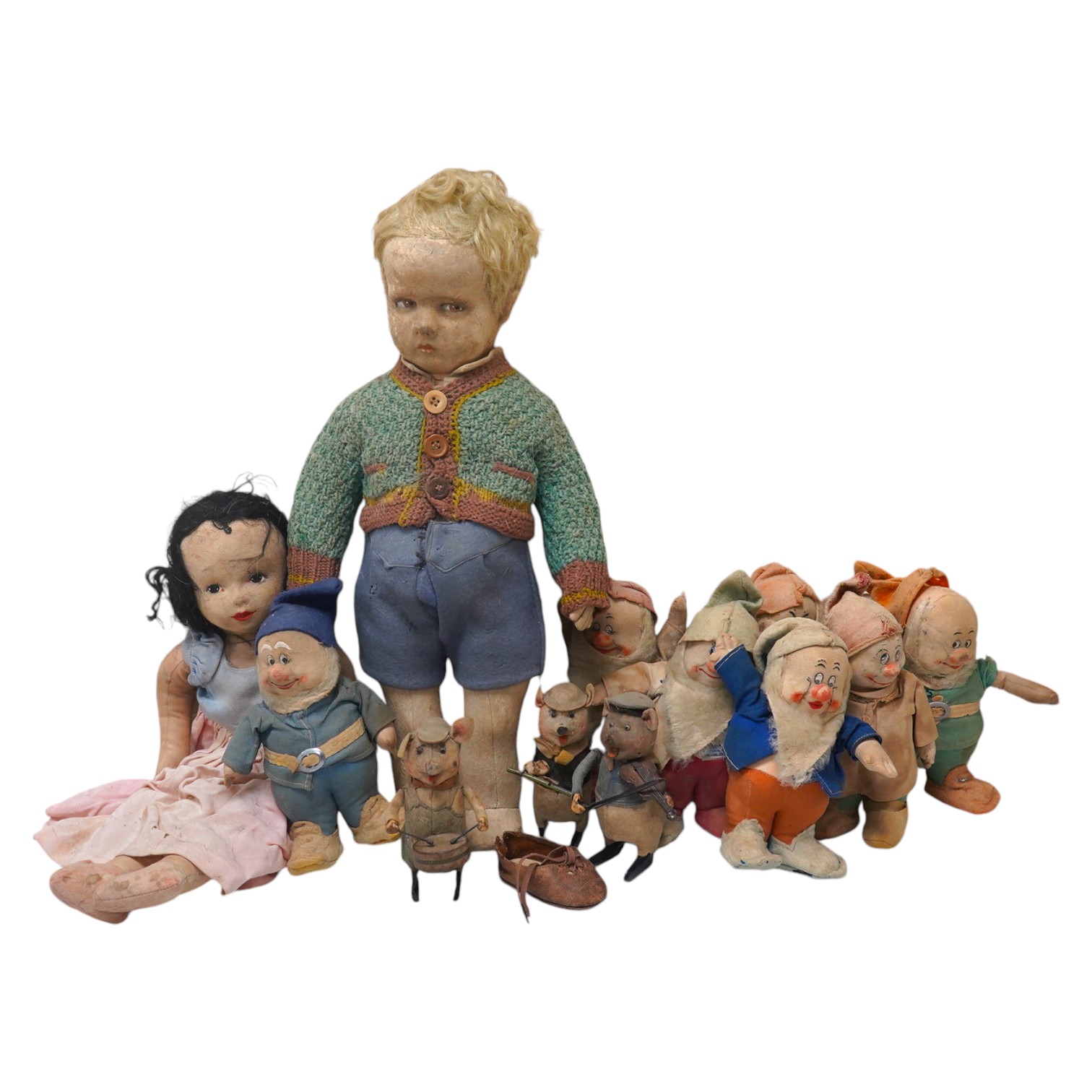 A Merrythought Hygienic Toys Snow White and the seven dwarves, three Schuco clockwork pig musicians and a felt doll. Condition - fair.